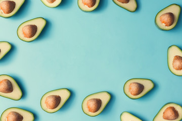 Avocado colorful pattern on a pastel blue background. Summer concept. Flat lay. - 210831930