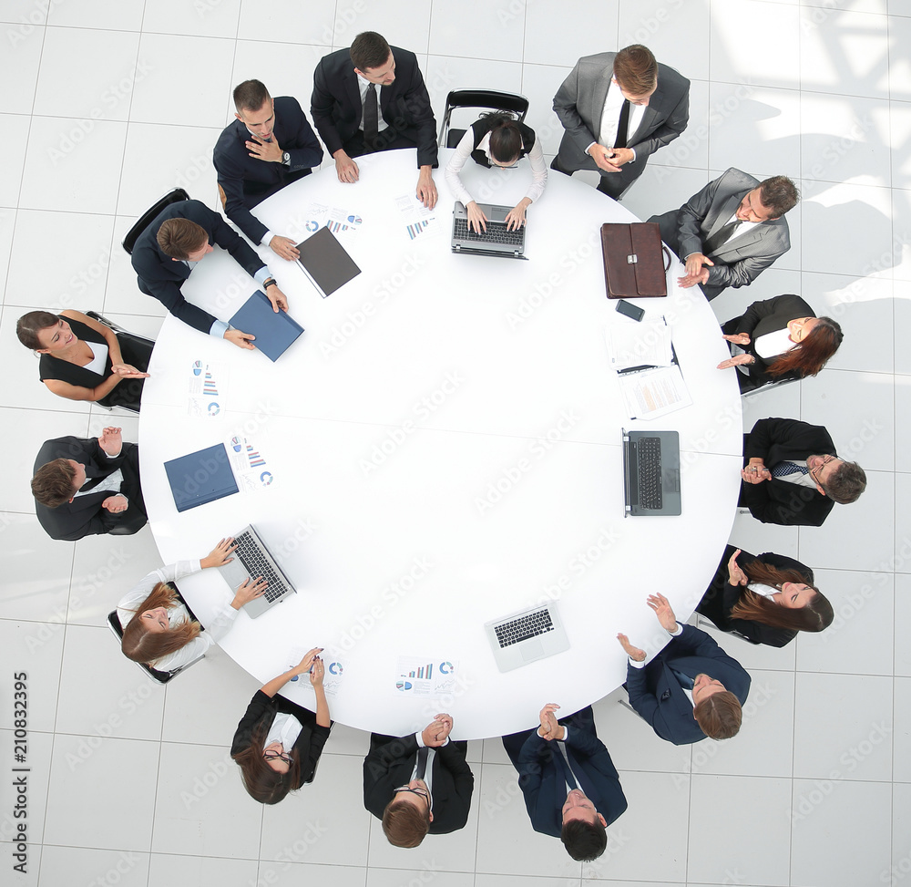 Poster view from the top.meeting business partners for round - table.