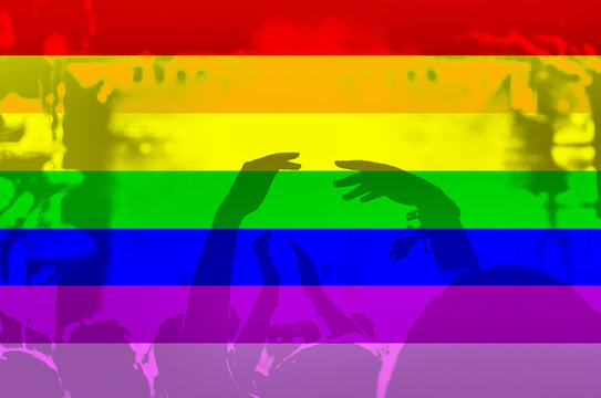 Gay rainbow flag and crowd