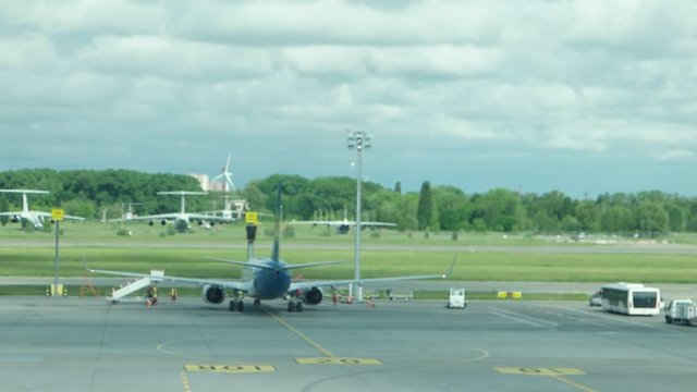 Pre-flight preparations of the plane  on the airfield   of the Boryspil International Airport, Kiev, Ukraine