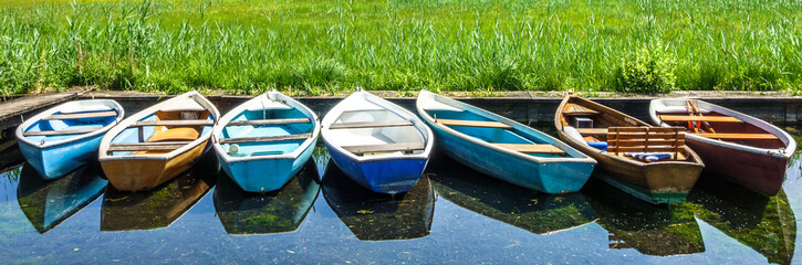 Fototapeta na wymiar old wooden rowboats