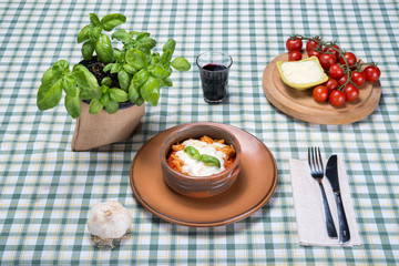 Fried pasta with cherry tomatoes and buffalo mozzarella