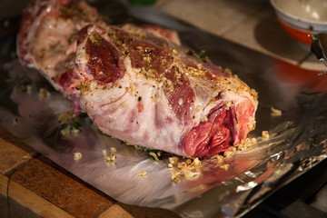 Raw Meat Cooking. Lamb meat in Marinade. Herbs and Spices,Foil paper.