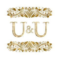 U and U vintage initials logo symbol. The letters are surrounded by ornamental elements. Wedding or business partners monogram in royal style.