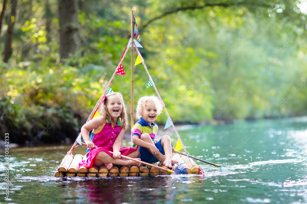 Poster kids on wooden raft