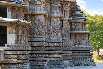 Facade and ornate wall panel relief of the west side, Hoysaleshwara temple, Halebidu, Karnataka, India