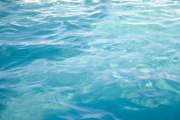 Blue sea ocean water background .Tropical Pattern blue ripple curl water in swimming pool .