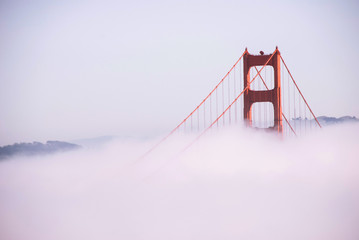 San Francisco Golden Gate bridge on foggy day dramatic evening light view from Marin Headland side - Powered by Adobe