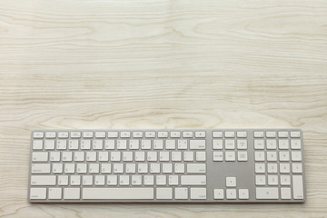 office computer keyboard on the table desk .Wireless input device technology concept .top view
