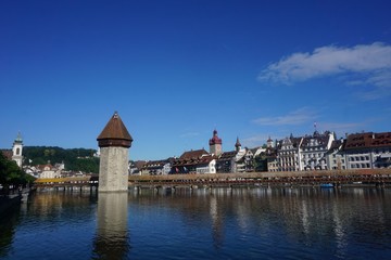 Water tower in Switzerland town at a lake