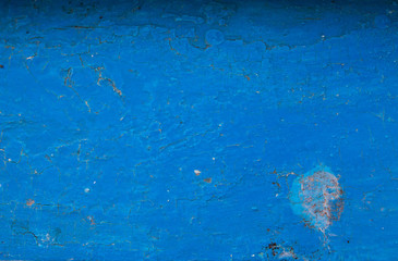 Dark blue painted texture with scratches. Old rustic and vintage background.