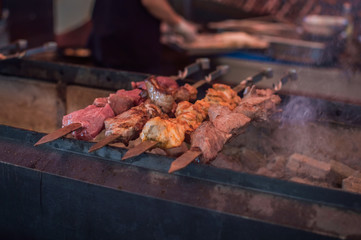 shish kebabs, tasty meat is roasted on coals, grill