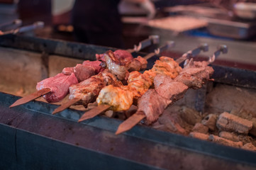 shish kebabs, tasty meat is roasted on coals, grill
