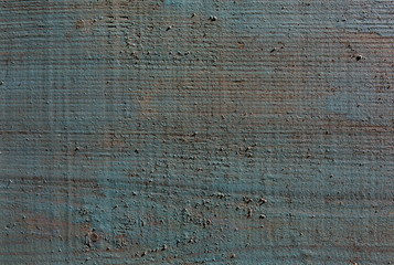 Old vintage blue and beige painted wooden planks. Rustic background texture with scratches.