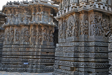 Facade and ornate wall panel relief of the west side, Hoysaleshwara temple, Halebidu, Karnataka, India