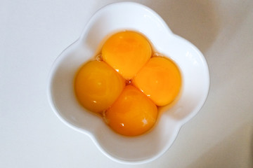 Four eggs on a bowl