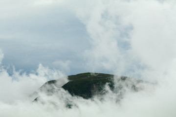 Dramatic clouds in the mountains. Cold stormy and cloudy day