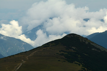 Dramatic clouds in the mountains. Cold stormy and cloudy day