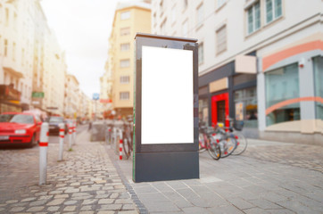 City light, video led billboard mockup on street. Cars in background.