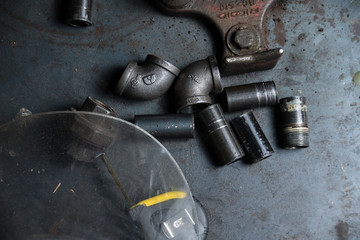 Plumbing Pipe on a Steel Background 