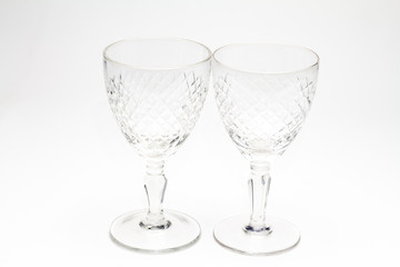 Crystal glasses on white background