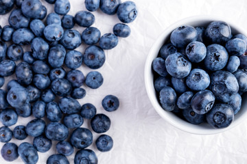 Fresh raw organic farm blueberry white background, copy space