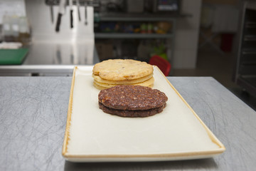 Cookies on a plate On a blurry background a restaurant kitchen