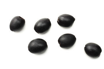 Fototapeta na wymiar Marinated black olives isolated on white background. top view