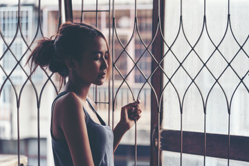 Hands catching railing. Feeling no freedom. Man holding the cage imprisoned make no freedom or lack...