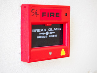 UK Fire Alarm on white wall with tested stickers