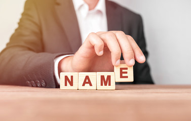 Man made word NAME with wood blocks