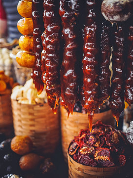 alani and churchkhela hanging on market at armenia