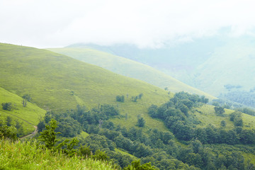 White magic clouds at mountains range. Journey in the mountains. Hiking Travel Lifestyle concept 