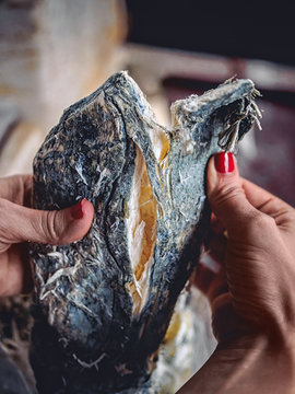 cropped shot of woman holding homemade molded chechil cheese