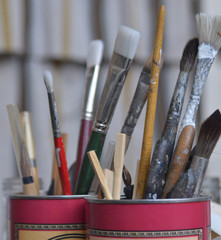 Paintbrushes in Cans