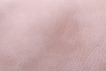 the texture skin is pink in color. closeup. background