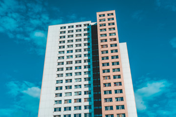 typical plattenbau skyscraper at berlin, mitte with darken sky