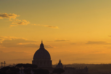 Obraz premium St Peter's basilica dome at sunrise in Rome, Italy