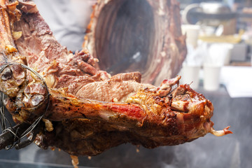Pieces of lamb roasted on a spit over burning coals. Outdoor grill