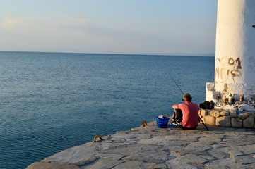 fisherman on the seashore
