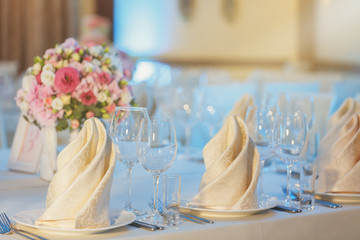 Table arrangement in restaurant. Wedding design