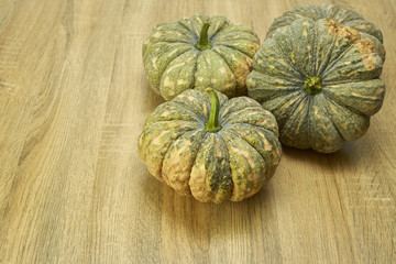 Pumpkins against a rustic
