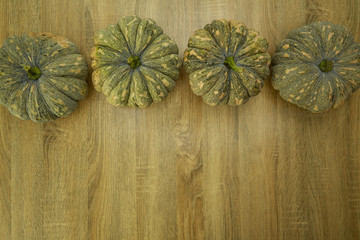 Pumpkins against a rustic