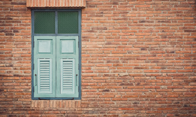 Fototapeta na wymiar vintage wall with green window