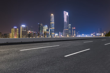 Naklejka premium Air highway asphalt road and office building of commercial building in modern city