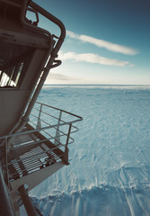 View from the wheelhouse of the Russian icebreaker on the Arctic sunset. Travel across the Kara sea. © Artem Markin