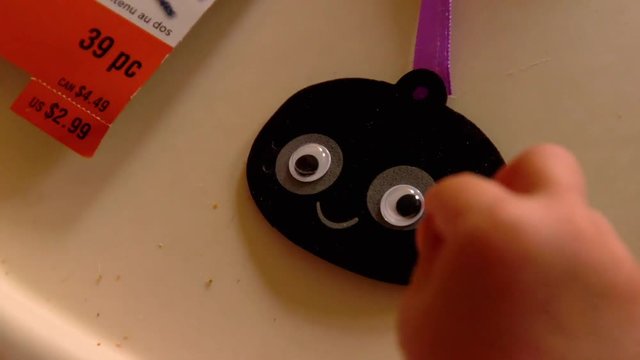 Video Of A Young Toddler Boy Making Spooky Halloween Crafts With His Mom At Their Living Room Table