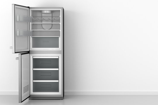modern open empty fridge in front of white wall