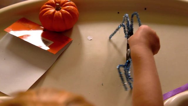 Video Of A Young Toddler Boy Making Spooky Halloween Crafts With His Mom At Their Living Room Table