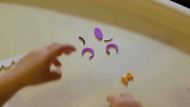 Video Of A Young Toddler Boy Making Spooky Halloween Crafts With His Mom At Their Living Room Table